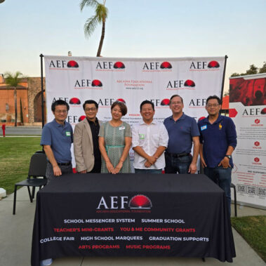 Steve Rhee at the Arcadia Educational Foundation booth with other members.