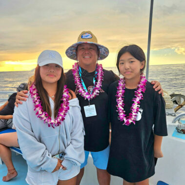 Steve Rhee with his daughter on a boat.