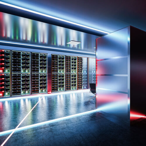 Mock up of data center with rows of server racks.